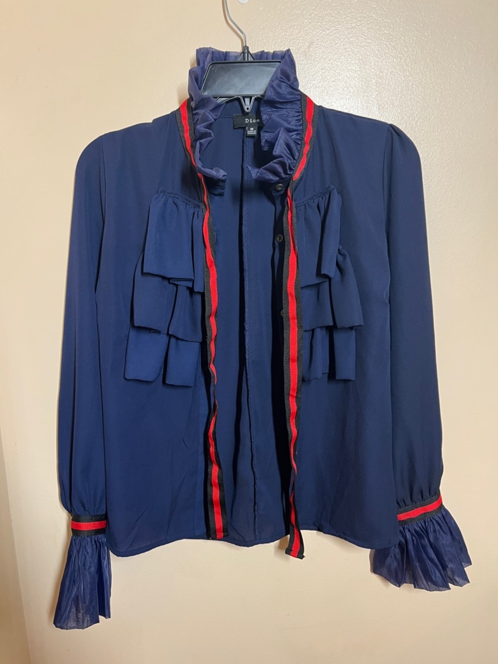 Navy Ruffle Tie-Neck Blouse with Red Trim